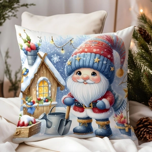 Detail of Christmas pillowcase with festive elf and snowy cabin print on white fabric