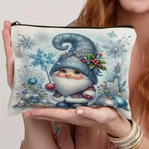 Detailed view of blue Christmas gnome linen bag with zipper closure held by hand