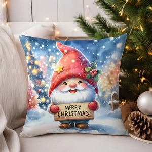Detail of a Christmas gnome pillowcase with Merry Christmas sign on a white sofa