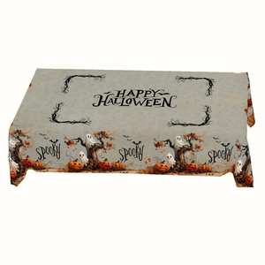 Detail of Happy Halloween tablecloth featuring spooky pumpkins, ghosts and bats patterns