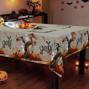 Halloween spooky tablecloth featuring ghosts, pumpkins and bats on a grey background