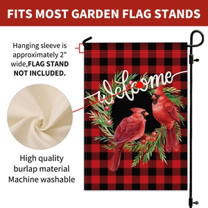 Detail of red and black plaid garden flag with cardinal bird and Welcome text