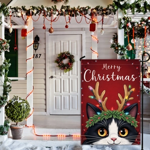 Outdoor Christmas garden flag with a black and white tuxedo cat and Merry Christmas text