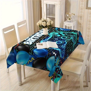 Détail de nappe d'anniversaire gaming avec manettes néon et graphismes de ballons