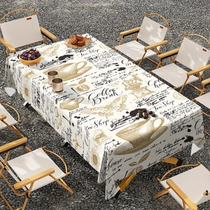 Table de camping en plein air avec nappe vintage à motif de café et de thé