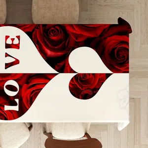 Valentine's Day tablecloth with red roses and LOVE print on a flat lay dining table