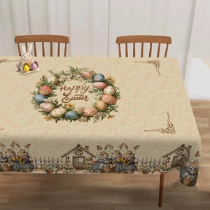 Detail of Happy Easter tablecloth with rabbits, floral eggs, and rustic house designs