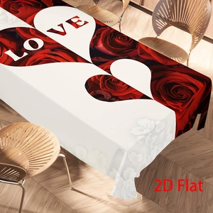 Detailed shot of a Valentine's Day tablecloth with red roses and white heart LOVE patterns