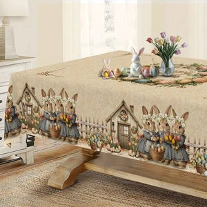 Detail of Happy Easter tablecloth with cartoon rabbits, floral motifs, and colorful eggs