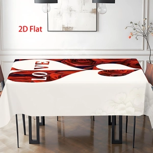 Detail view of rectangular tablecloth with red rose heart pattern and LOVE text print