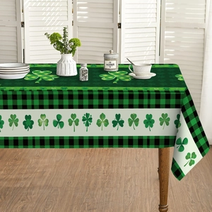 Saint Patrick's Day tablecloth with green shamrock prints and buffalo plaid edges