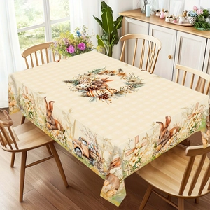 Easter tablecloth with vintage truck and bunny motifs on a beige checkered background