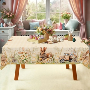 Close-up of Easter tablecloth with festive bunny, egg patterns, and vintage truck details
