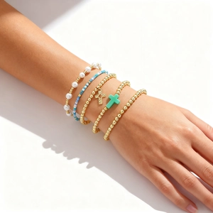 5-piece gold layered bracelet set with cross pendants and pearl beads for women