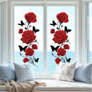 Romantic red rose and butterfly window stickers on a scenic sea view glass panel