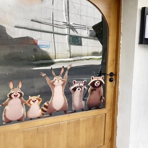 Cartoon animal glass window stickers featuring cute rabbits and raccoons for kids room decor