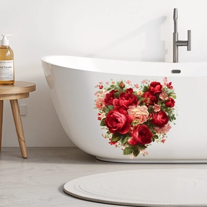 Détail d'un autocollant mural cœur rose rouge sur une baignoire blanche pour la déco