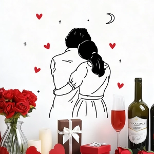 Romantic silhouette wall sticker with hugging couple and red hearts for bedroom decor