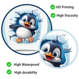 Macro view of high-definition 3D penguin sticker showing waterproof vinyl texture