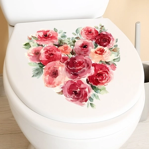 Gros plan d'un autocollant mural cœur de roses roses sur un couvercle de WC blanc