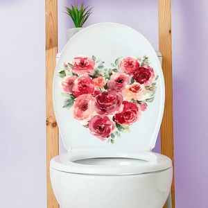Détail macro d'un sticker mural cœur de roses rouges sur un mur de salle de bain violet