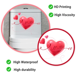Detail showing 3D heart wall decal with Love lettering and pink ribbon on a toilet tank