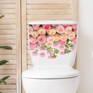 Detail of floral toilet tank sticker with realistic pink roses and green leaves on white