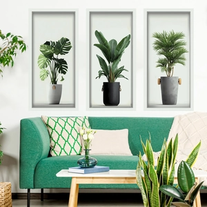 Modern 3D wall decals featuring green potted plants in a stylish living room setting