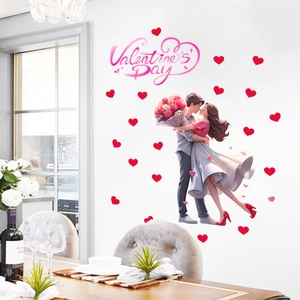 Romantic Valentine's Day wall stickers featuring cartoon couples and red hearts on white wall