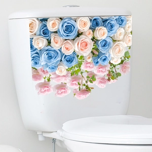 Detail showing colorful floral rose stickers on a white ceramic bathroom toilet water tank