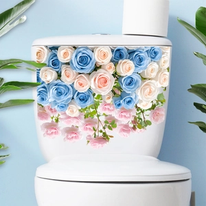 Close-up of waterproof floral toilet stickers with colorful roses on a white tank