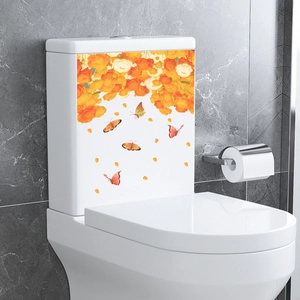 Vibrant orange flowers and butterflies adhesive bathroom sticker on white ceramic toilet tank