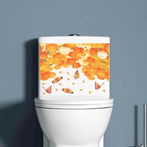 Vibrant floral toilet sticker with orange flowers and butterflies in a bathroom setting