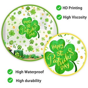 Detail of St. Patrick's Day window clings showing shamrocks and gold coins on glass