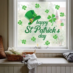 St. Patrick's Day window decals with green hat and shamrocks on a cozy home window