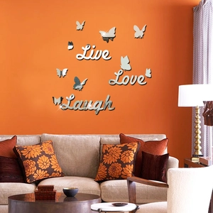 Detail of silver acrylic mirror wall stickers with Live Love Laugh and butterfly shapes