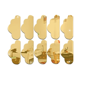 Detail of 10-piece gold acrylic cloud mirror wall stickers with reflective surface for kids room