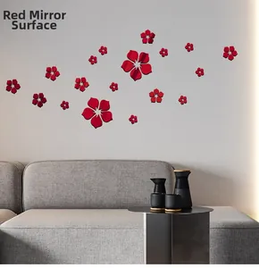Detailed view of red 3D acrylic mirror flower wall decals in a modern living room
