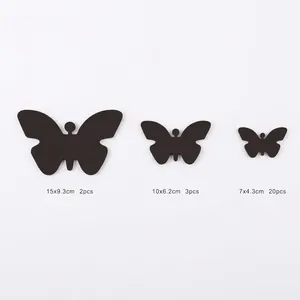25-piece set of black 3D butterfly mirror wall stickers in three assorted sizes