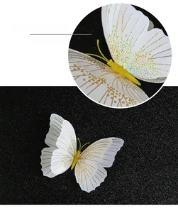 Detail view of 3D double-layer butterfly wall sticker with golden glitter lines and wings