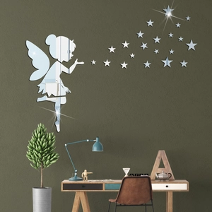Macro detail of acrylic mirror wall stickers featuring a fairy blowing stars design