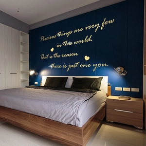 Macro detail of golden acrylic mirror wall decal with inspirational precious quote