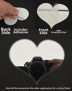 Detail showing self-adhesive backing and protective film on heart acrylic mirror stickers