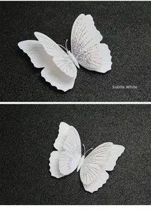 Detail of 3D double-layer white butterfly wall decor with sparkling silver glitter lines