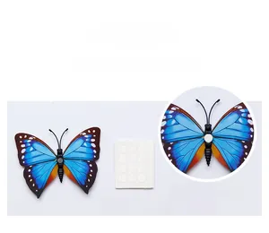 Detail of 3D blue butterfly wall stickers with adhesive foam dots for installation