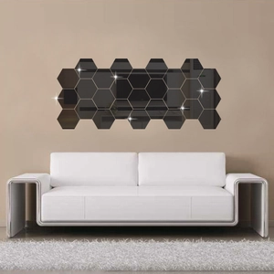 Detail of hexagonal acrylic mirror wall stickers in a modern honeycomb pattern design