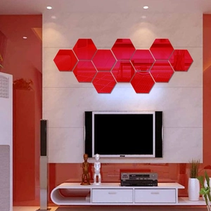 Detail of twelve red hexagonal acrylic mirror wall stickers in a honeycomb layout