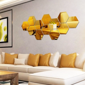 Detail of 12pcs gold hexagonal acrylic mirror wall stickers in a modern living room