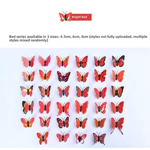 Dettaglio degli adesivi murali a farfalla rossa 3D in dimensioni 4,5cm, 6cm e 8cm decor