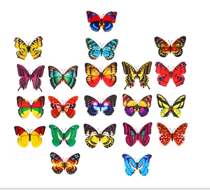 Assortment of vibrant 12cm double-layered PVC butterfly garden stakes with realistic wing patterns